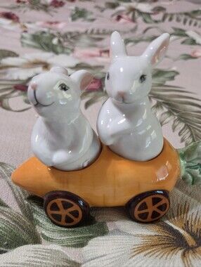 2 White Bunnies sitting on a carrot wagon (Salt n Pepper Shakers)